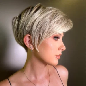 13 blonde side swept pixie bob with dark roots