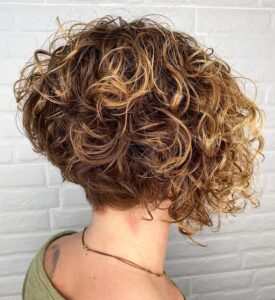 4 stacked short curly bob cut with blonde highlights