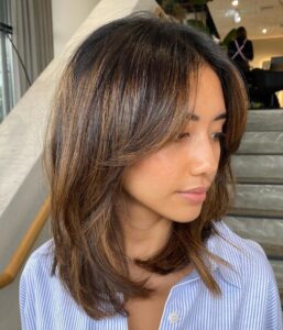 8 medium haircut with bangs for soft straight hair