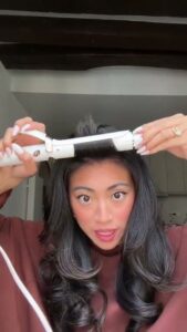 Curtain Bangs: How to Style and Grow Them Out 9b46fd225c4d89db9691c4841e9e9098