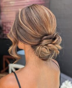 effortless romantic textured low bun updo wedding hairstyle