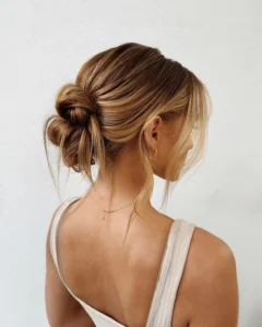 low bun with face framing strands