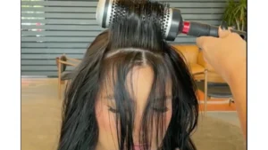 Curtain Bangs: How to Style and Grow Them Out how to style curtain bangs with round brush 1697205679