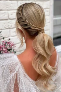 low ponytail side braid blonde