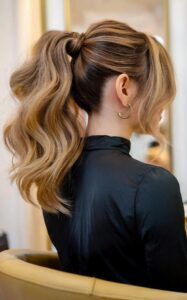 perky pony with face framing strands for the prom