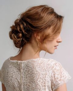 tendrilla bun low hairstyle