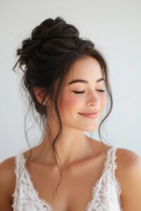 high bun with face framing pieces