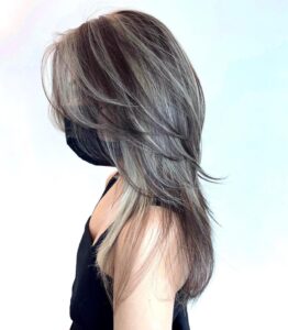 long wolf cut with money piece highlights