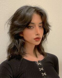 medium wolf cut, blown out with volume