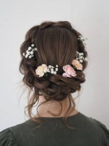 braided updo with fresh flowers