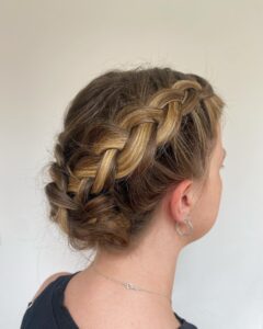 low chignon with braided wrap