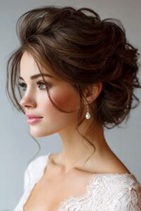 textured updo with face framing pieces