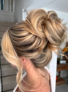 voluminous updo with soft waves